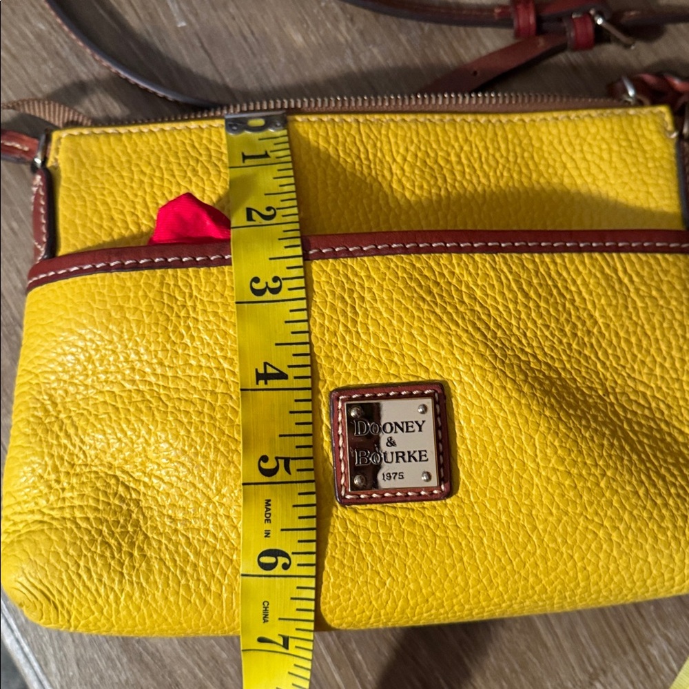 Dooney & Bourke Pebble Grain Dandelion and Brown Leather Crossbody Bag - Picture 5 of 13